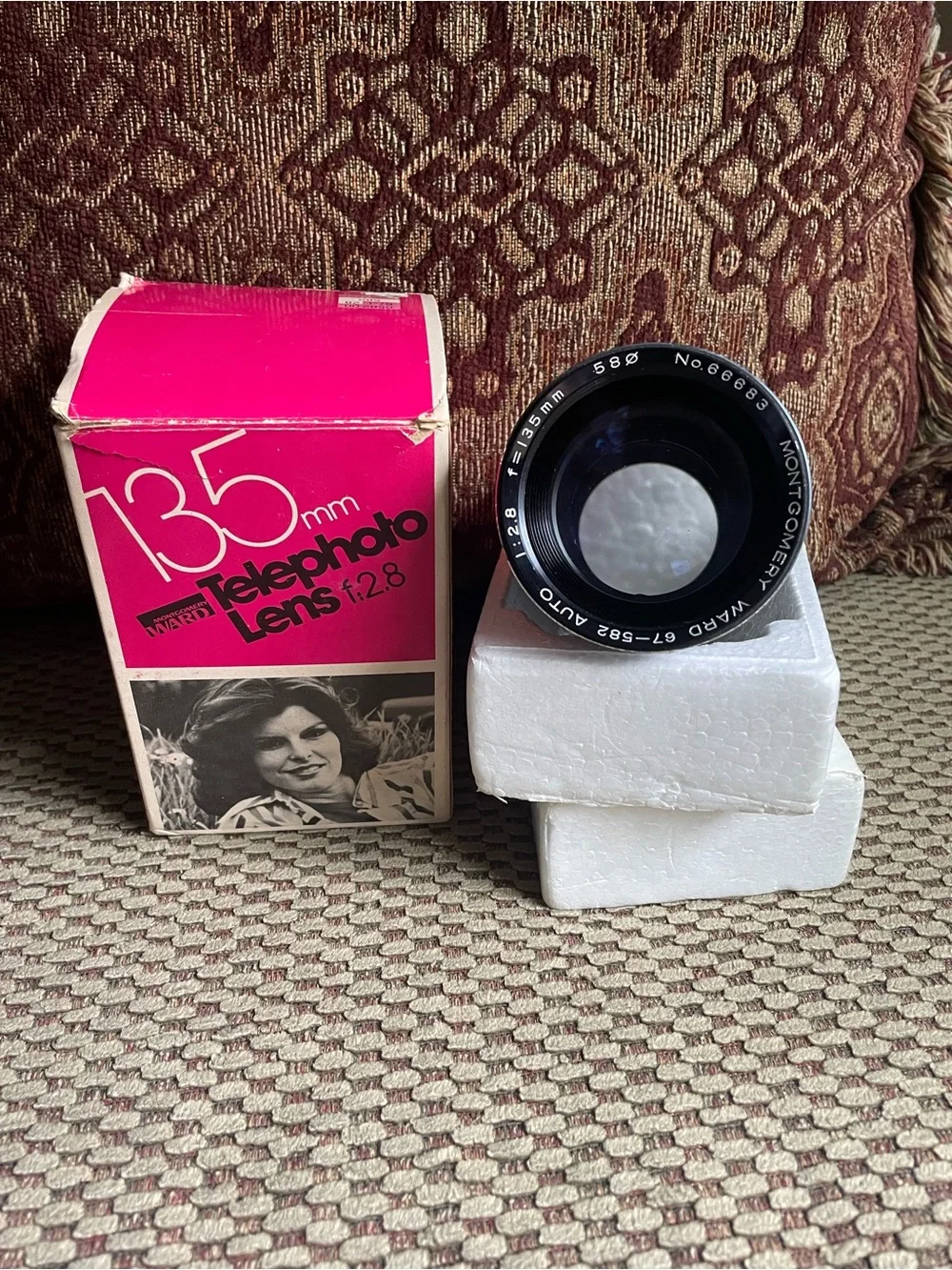 135mm f/2.8 Telephoto Lens in Pink Packaging